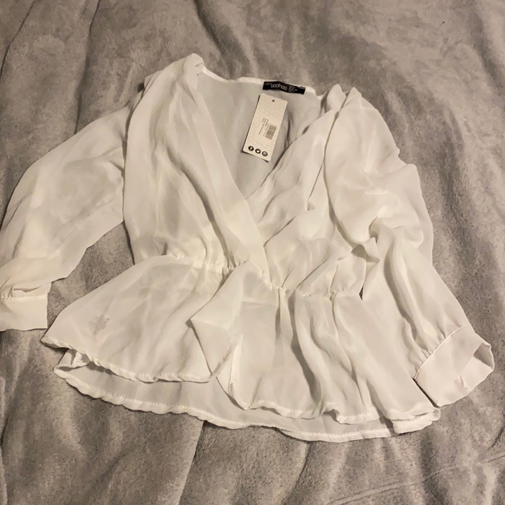 Sheer dress shirt in white. Size 4